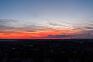 Beautiful sunset sky over city horizon landscape
