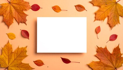 Autumn Leaves Frame with Blank Card on Peach Background.