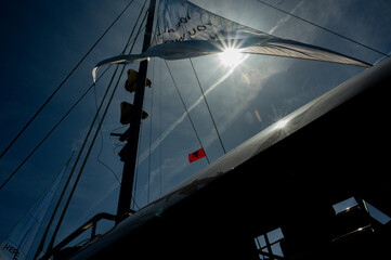 Albanian flag on yacht mast rigging against the sky