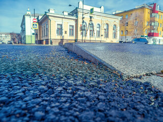Sidewalk with a wheelchair ramp. Accessible environment, city for everyone. Close-up