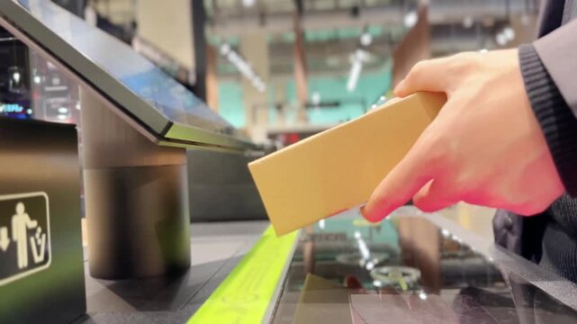 buying make up at cosmetics section in store,self checkout systems in  retail stores,Barcode scanner,Self checkout machine