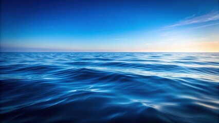 Obraz premium Serene Ocean Horizon A Captivating View of Calm Waters Under a Vast, Clear Sky at Daybreak