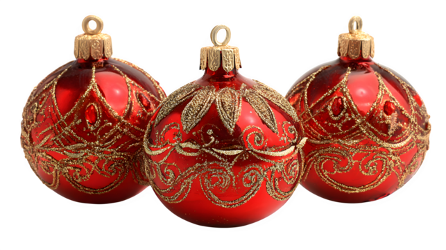 Elegant red ornaments with gold detailing reflecting warm light isolated on white background