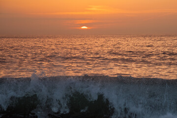 Obraz premium Atlantic ocean , sunset, Nazare , Portugal.