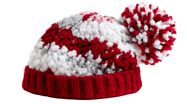 Festive holiday cap with pom-pom in white and red tones isolated on white background