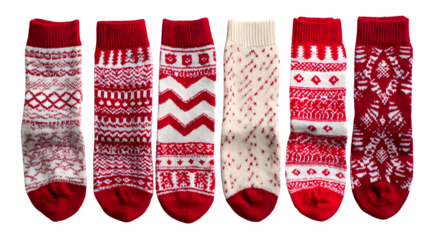 Festive red and white patterned Christmas socks isolated on white background