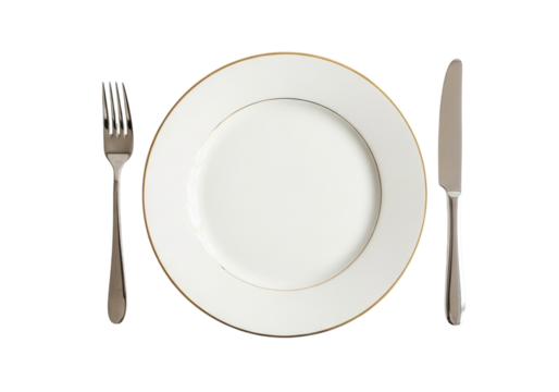 White plate with gold rim, fork, and knife set for dining