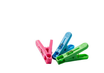 Three colorful plastic clothespins