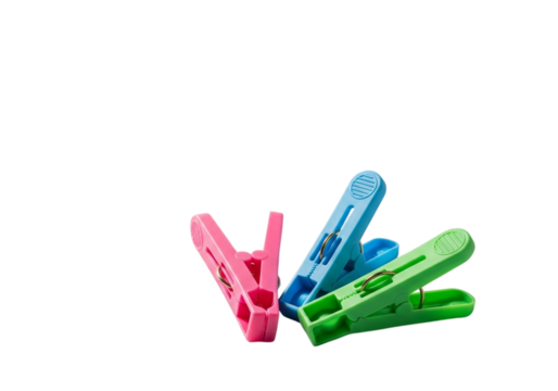 Three colorful plastic clothespins