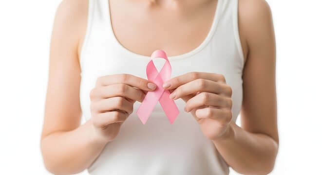 Breast cancer awareness symbol with pink ribbon held by woman promoting health and support for cancer patients