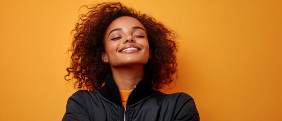 Joyful young lady with crossed arms
