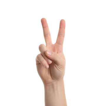 A Human Hand Forms A Peace Sign Gesture With Two Fingers Raised Against A Black Background Isolated Object With Clear Skin Tone And Natural Lighting