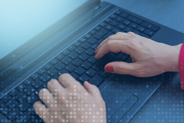 Hands typing on laptop keyboard with digital overlay, concept of cyber technology, data processing, online communication, and secure digital connection
