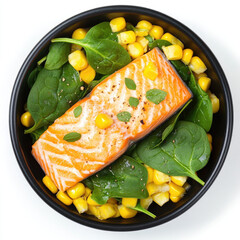 Boiled salmon with spinach and sweet corn in bowl