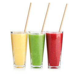 Yummy smoothies of different flavors in glasses isolated on white