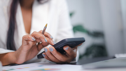 Businesswoman Using Smartphone for Digital Communication and Productivity