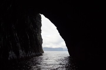 The steep and dramatic coastline around the Vestmanna Cliffs in the Atlantic Ocean off the Faroe Islands © ChrisOvergaard