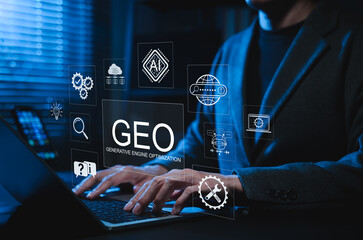 GEO Generative Engine Optimization Concept. Professional using laptop with AI icons represents...
