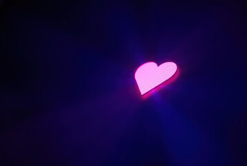 Close-up of a pixel cursor on a heart – digital affection.