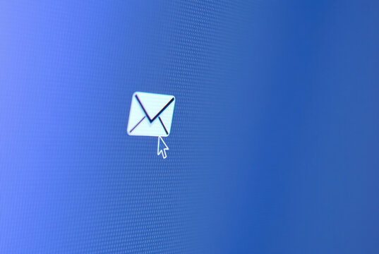 Pixel cursor on a mail icon – detailed screen display imagery.
