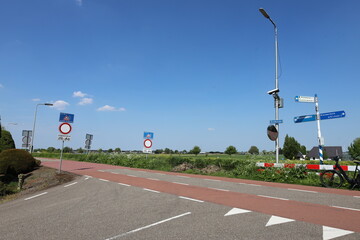 Obraz premium Camera surveillance on the dike along the ring canal Zuidplaspolder to prevent driving here