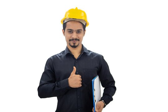 Confident Indian engineer wearing hard hat giving thumbs up - Powered by Adobe