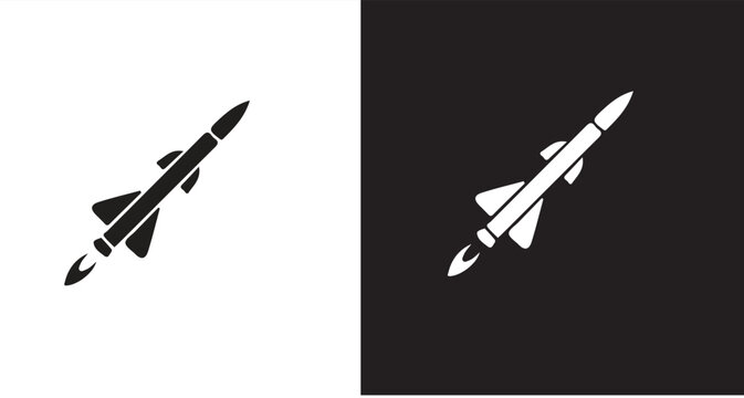 Silhouette of a missile or rocket in flight with exhaust trail