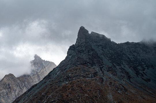Overcast and gloomy, the rugged rocky peaks of high-altitude regions