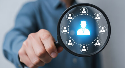 Magnifying Glass Focuses on Teamwork and Human Resources.