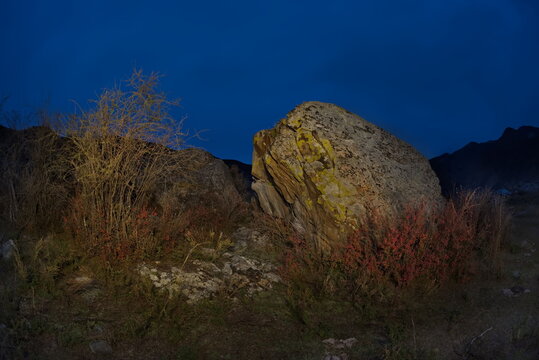 Russia. The South of Western Siberia, the Altai Mountains. Autumn moonlit night in the stone valley of the mountain river Katun near the village of Inia.
