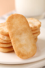 Crispy Rice Crackers Healthy Snack Food on White Plate