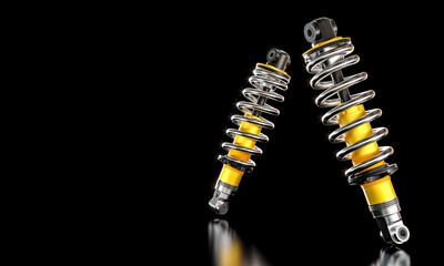 Two yellow car shock absorbers 3d on black