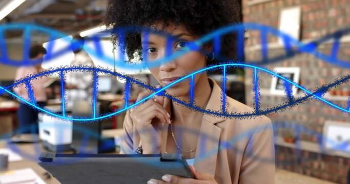 Reading woman in beige blazer touching chin while holding tablet in open office, with DNA overlay