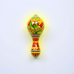 Handcrafted Folk Art Musical Instrument with Traditional Painting Isolated on White