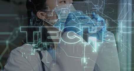 Pulling blue glove, female doctor in lab coat, stethoscope and surgical mask at clinic with TECH