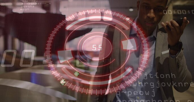 Gesturing man in suit holding phone, using red HUD projected at demo counter, copy space