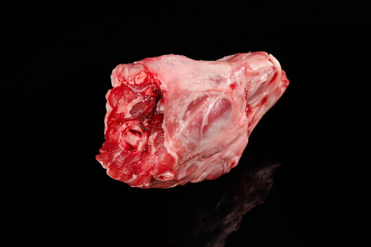 Fresh Raw Rabbit Head Meat on Black Background - Chongqing Butcher Shop Food Photography