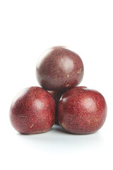 Fresh Red Plums with Speckled Skin Stacked on White Background - Healthy Organic Fruit