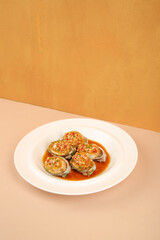 Steamed Abalone with Garlic and Vegetables - Premium Asian Seafood Dish