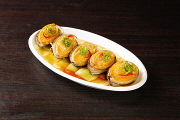 Steamed Abalone with Vermicelli Noodles - Traditional Chinese Seafood Delicacy on White Plate