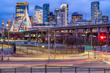 Boston in Massachusetts, USA at night showcasing the iconic North End of the city with its skyscrapers and lights.