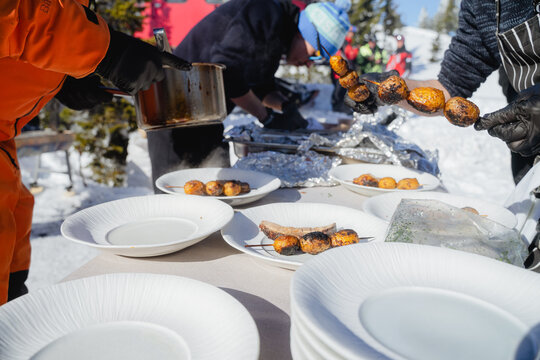 The coordinated work of chefs outside in winter, catering in the open air, cooking
