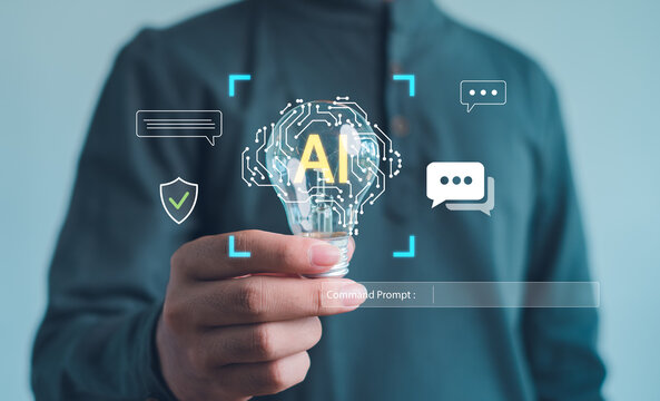 Artificial intelligence innovation concept with a person holding a glowing light bulb symbolizing AI, communication, and digital technology for future smart innovation and cybersecurity.