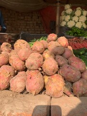 Fresh Organic Potatoes Displayed at Local Vegetable Market Stall