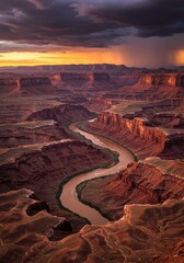 Canyon winds through landscape at sunset in the American Southwest