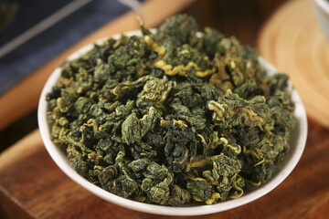 Dried Green Tea Leaves in Bowl - Healthy Herbal Wellness Ingredient for Traditional Medicine and...