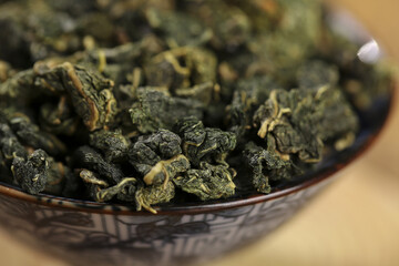 Dried Mulberry Leaves for Healthy Herbal Tea Recipe - Natural Alpine Wellness Ingredients in Glass Bowl