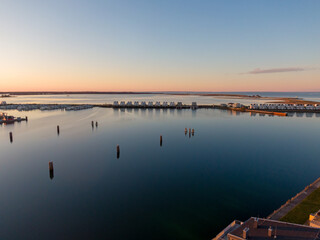 Aerial Sunset View of Olpenitz Harbor - Golden Hour Drone Shot Over Vacation Homes & Marina Baltic Sea Germany