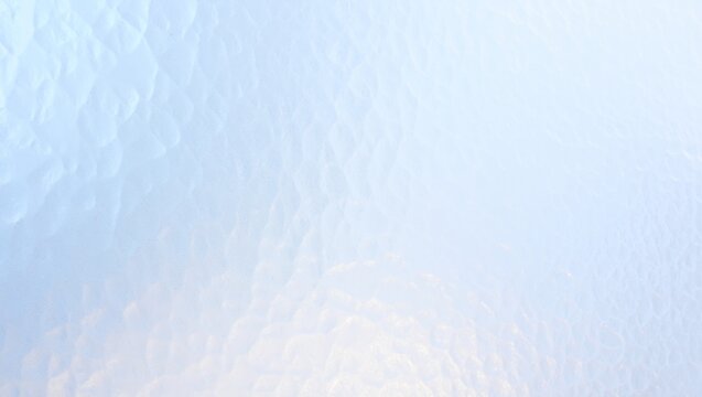 Frosted glass creating an iridescent pastel background texture, diffusing soft light and reflecting delicate shadows for serene organic patterns