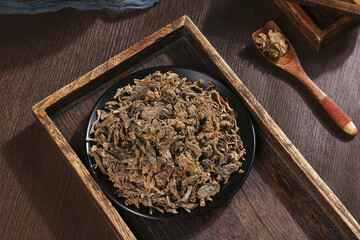 Traditional Chinese Dried Vegetables in Wooden Tray for Authentic Asian Cooking